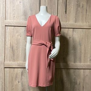 Express fitted mid length dress, front tie, pointed sleeves almost puff sleeve